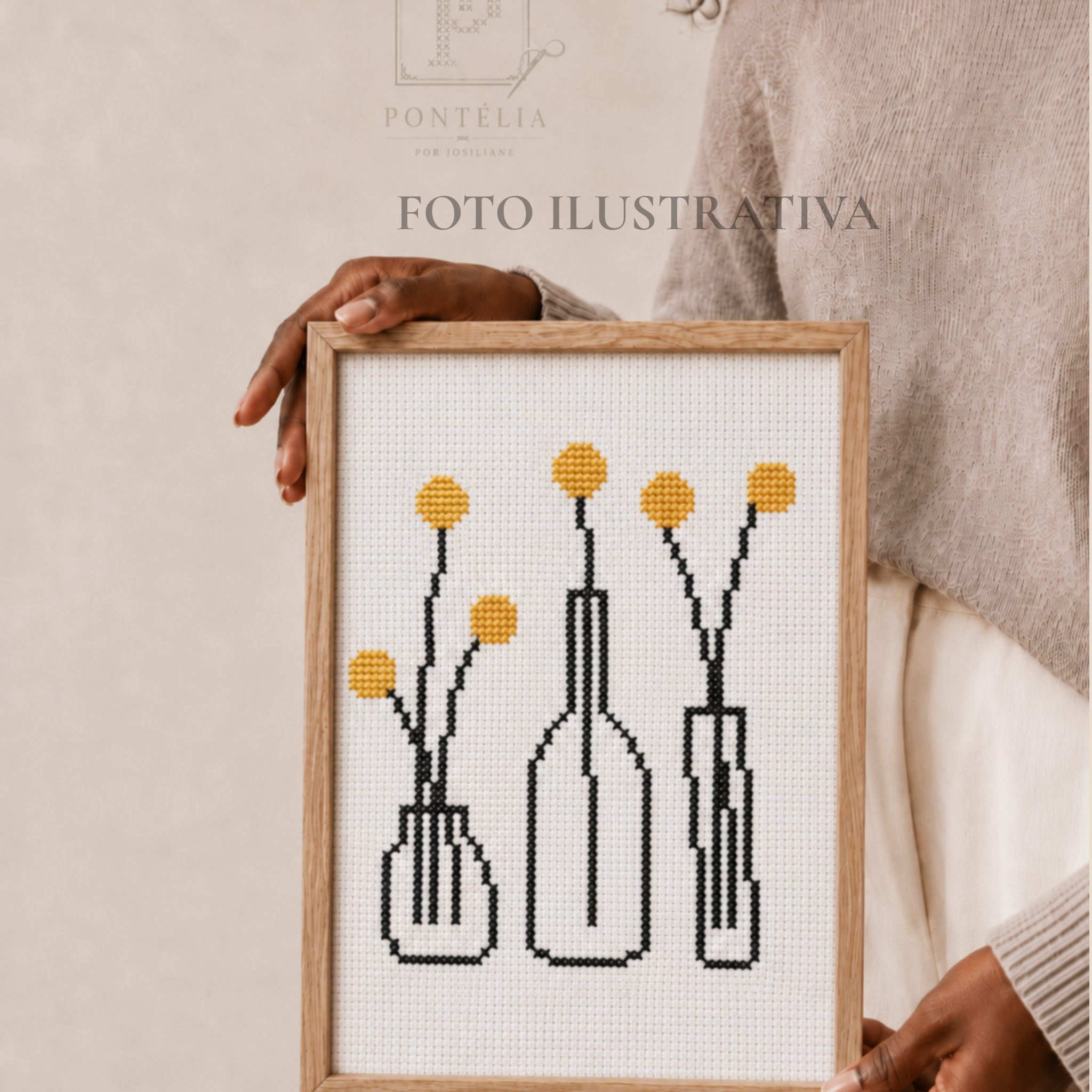 Imagem ilustrativa de Planta em Copos com três recipientes em cinza antracite e flores amarelas bordadas em ponto cruz sobre tecido Aida branco