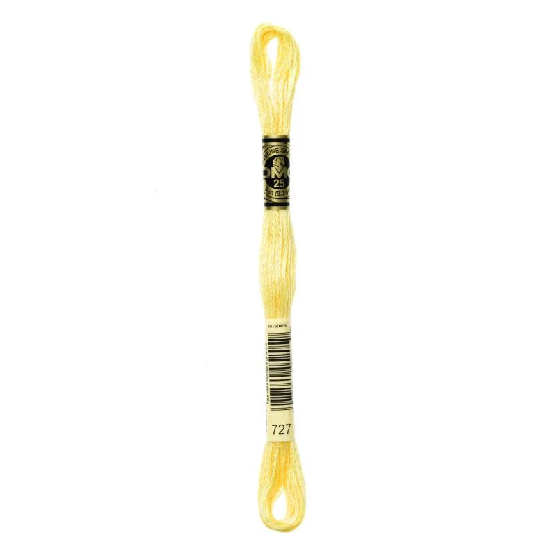 Novelo de linha amarela para ponto cruz, com etiqueta e laço